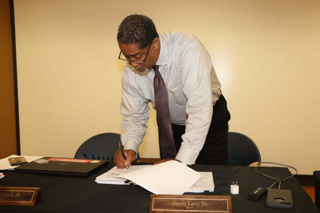 Jason signing