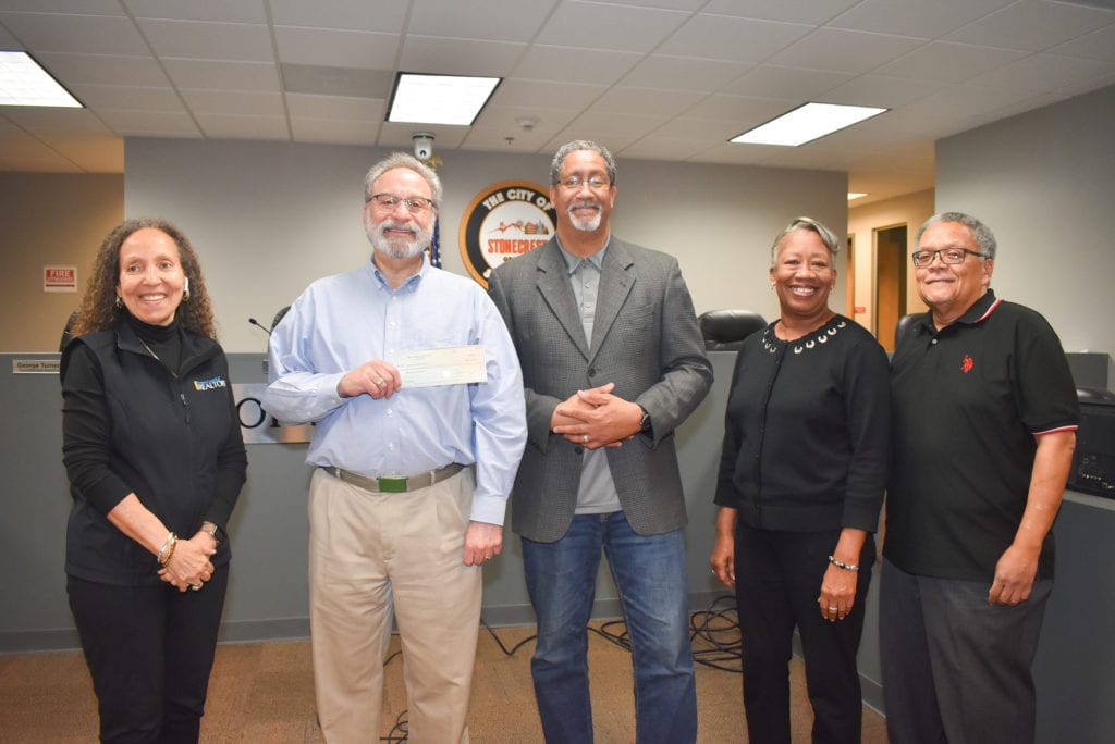 Housing Authority Members and First Check